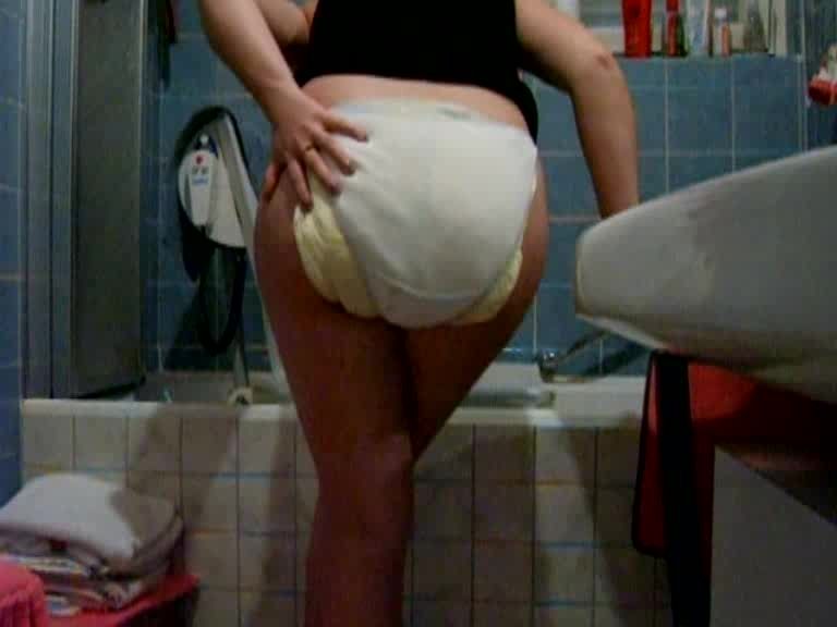 Girl peeing diaper video