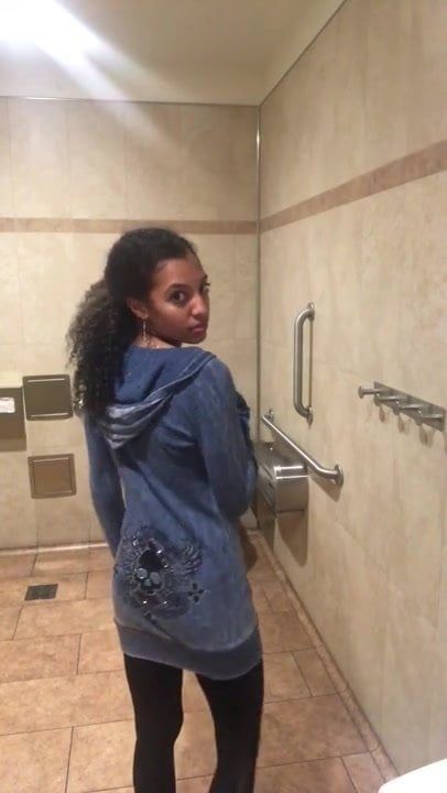 Ebony peeing in public