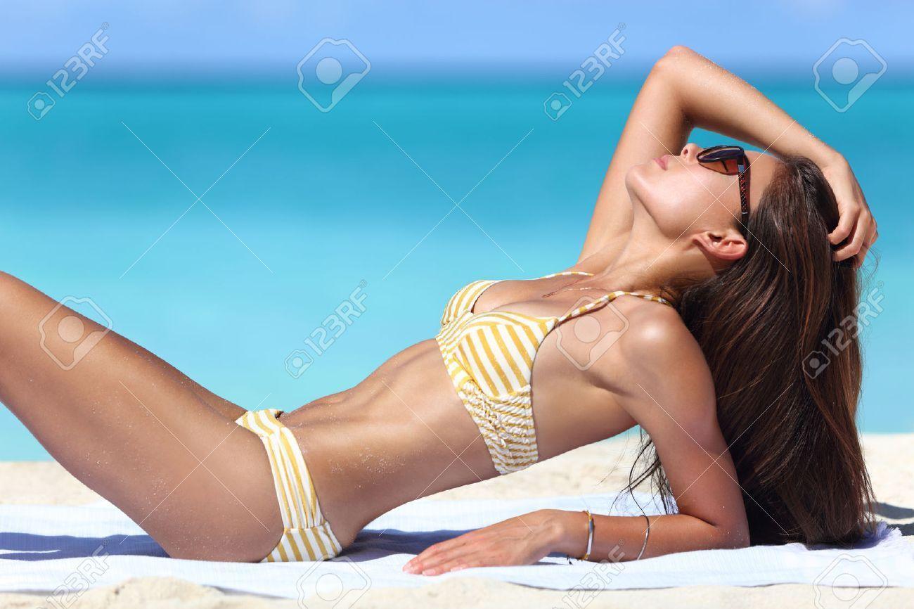 Bikini tanning woman