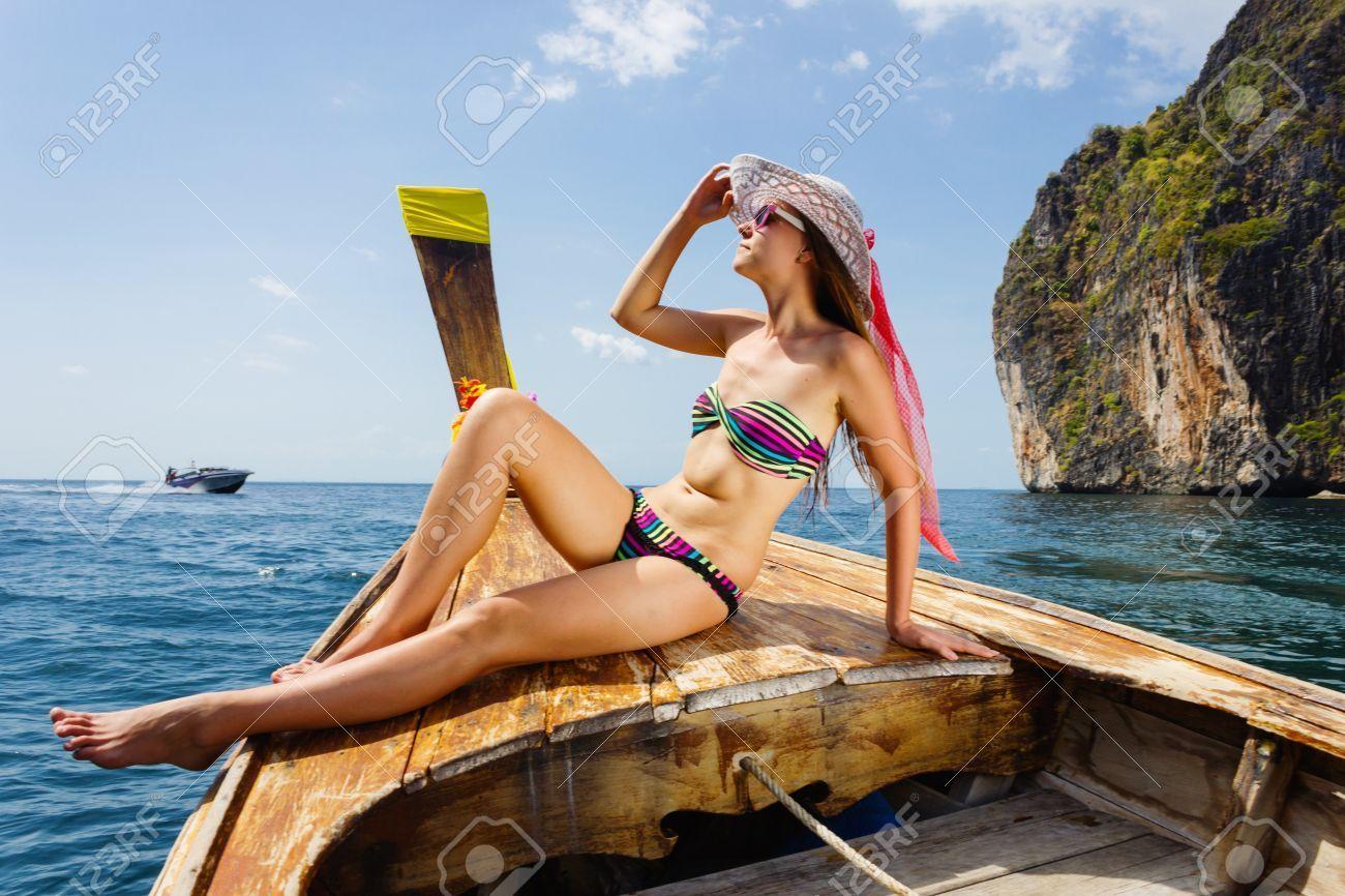 Bikini beach boat